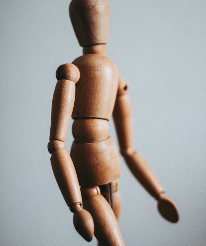 Woman walking along a road with her hands placed on her head, practicing balance